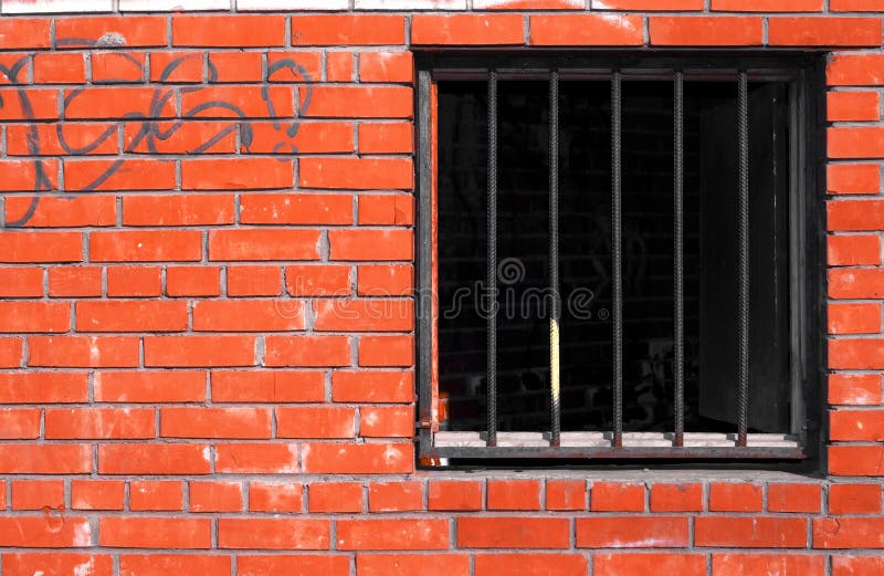 Brick wall, lattice at window