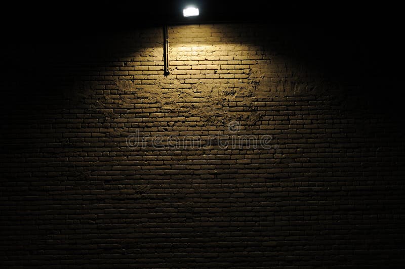 Brick wall with spotlight