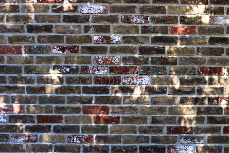 Brick Wall with sun spots stock photo. Image of brick 78661846