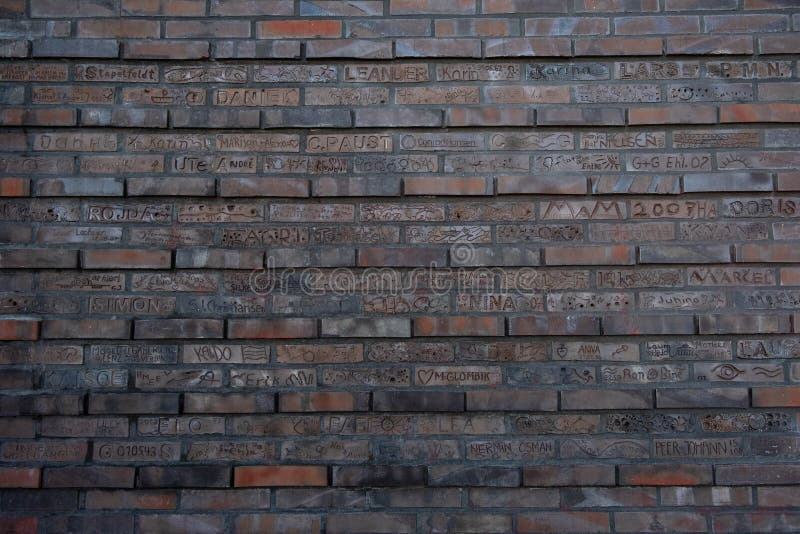 Brick Wall and Various Names Written on it Stock Image Image of rough