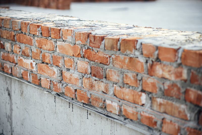 Bricks Masonry with Cement on Concrete Foundation Close Up, Process of