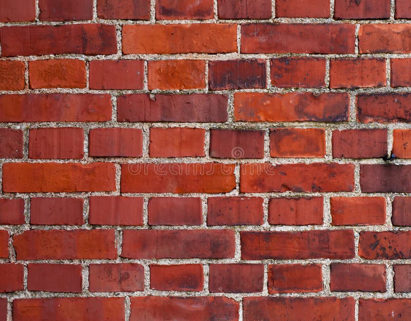 Red bricks wall background with large and small brickstones. Red bricks wall background with large and small brickstones