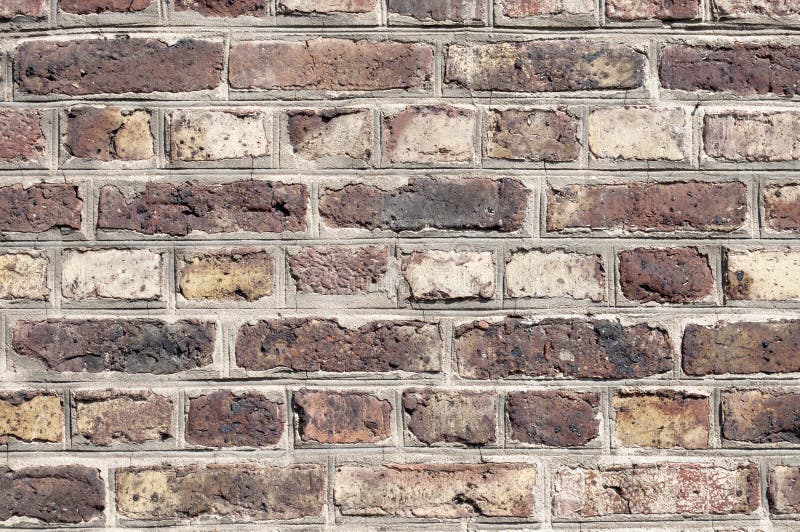 Detail of a brickstone wall at an old church - useable as background or texture. Detail of a brickstone wall at an old church - useable as background or texture