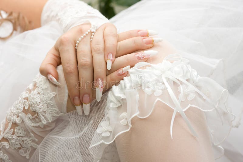 Beautiful bridal manicure and garter. Iso 200. Beautiful bridal manicure and garter. Iso 200