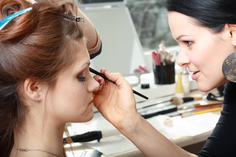 Young Beautiful Bride Applying Wedding Make-up Stock Photo - Image of ...