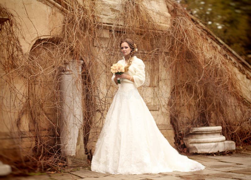 Bride beautiful woman in wedding dress - outdoor