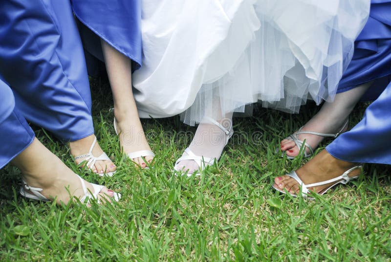 Bride and bridesmaids feet royalty free stock images