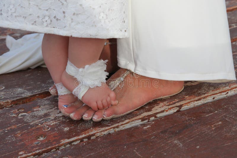 Bride and flower girl toes stock photo Bride and flower girl toes stock photo