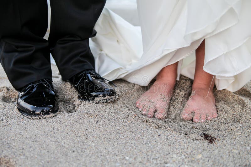Bride and groom on beach