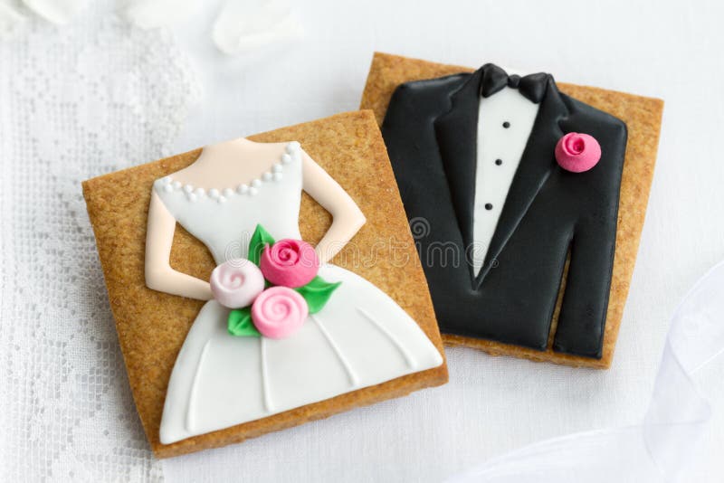 Bride and groom cookies stock photography