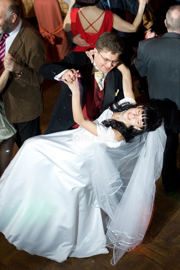 Bride and groom dancing