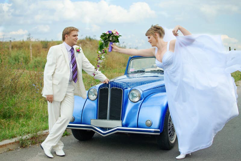 Bride and groom fooling with funny expressions