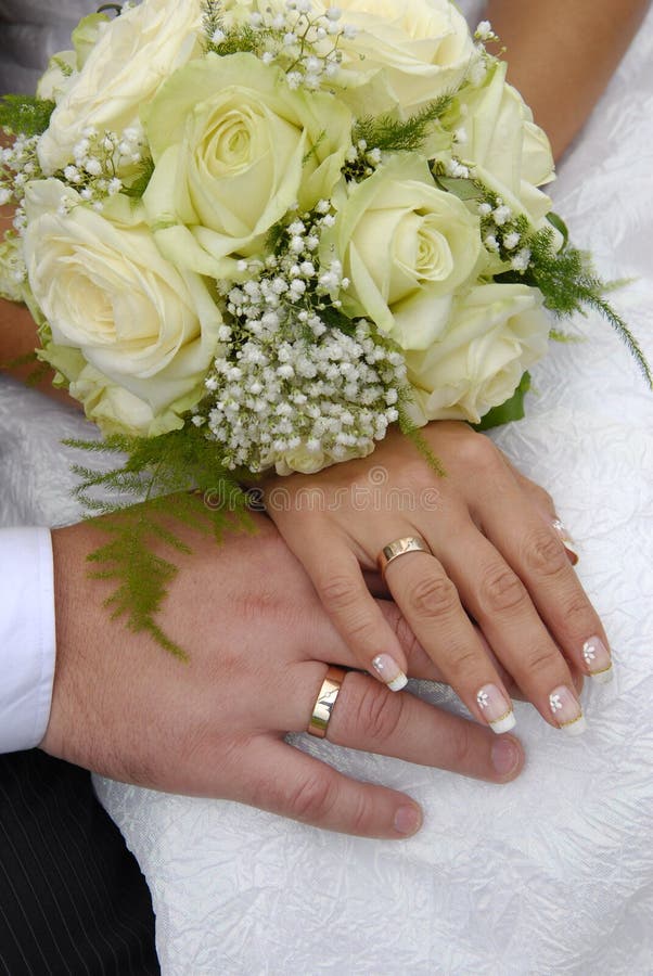 Bride and groom hands