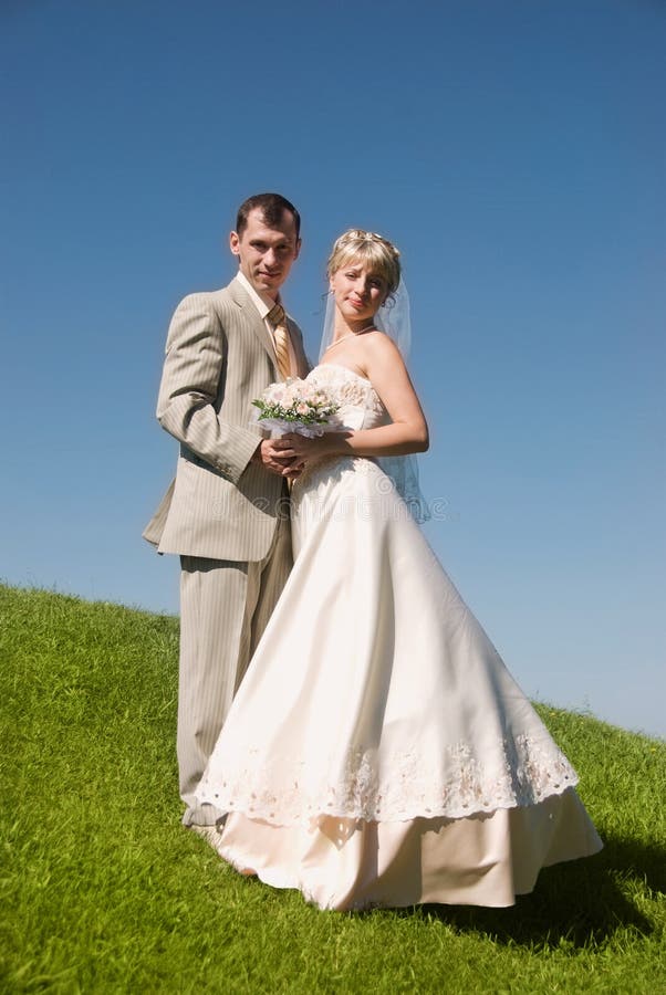 Bride and groom on the hill