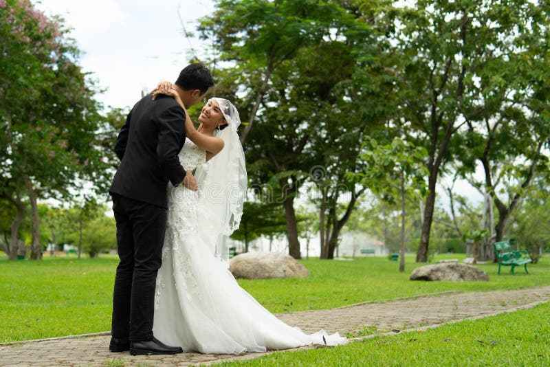 Bride and groom hug each other with love forever, couples wedding stock photography Bride and groom hug each other with love forever, couples wedding stock photography