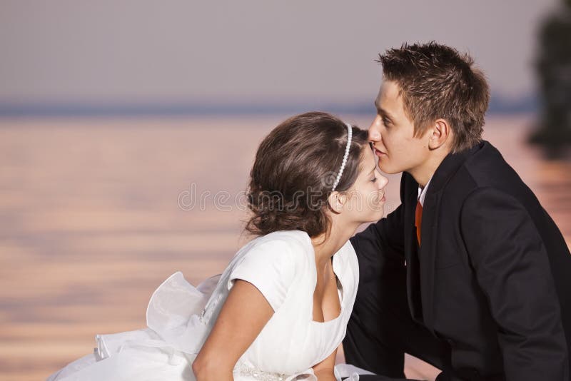 Bride and groom kissing