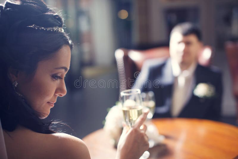 Bride and groom in the lobby. stock photo