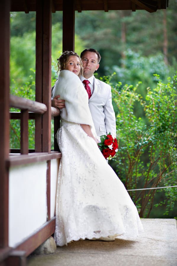 Bride and groom near house of japan style