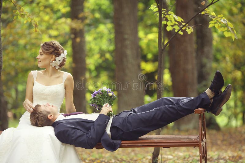 Bride and groom in park