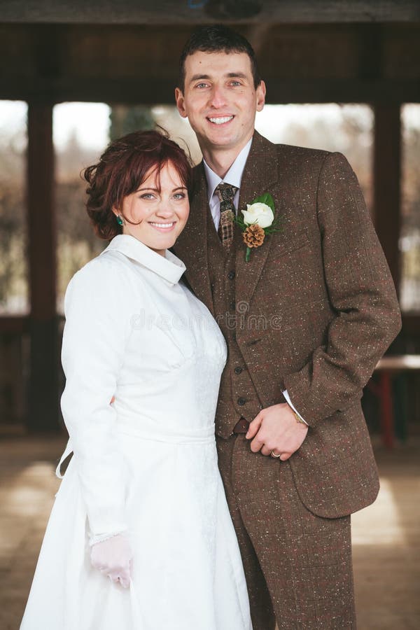 Bride and groom smiling