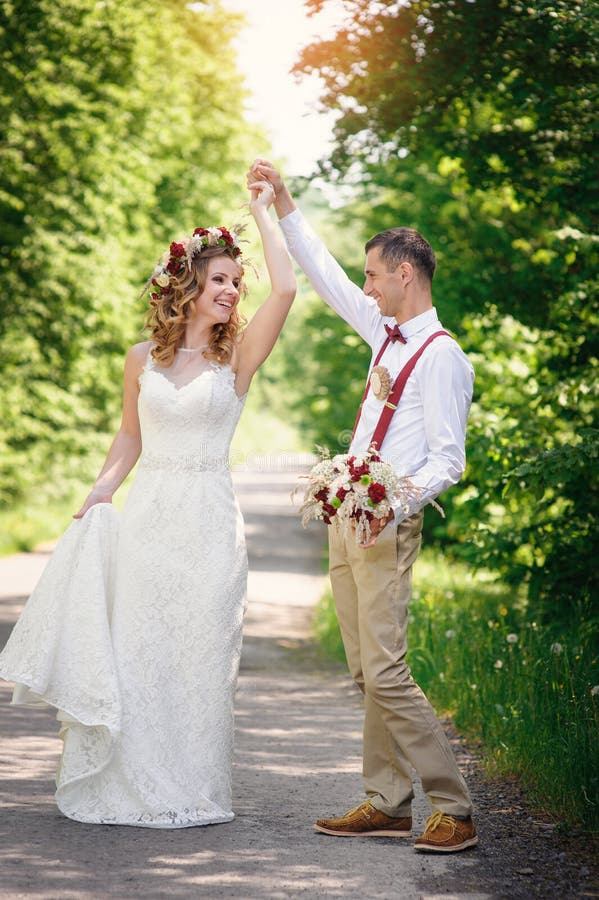 Bride and Groom at wedding Day walking Outdoors royalty free stock photography Bride and Groom at wedding Day walking Outdoors royalty free stock photography