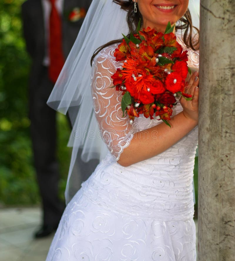 Bride near the column.