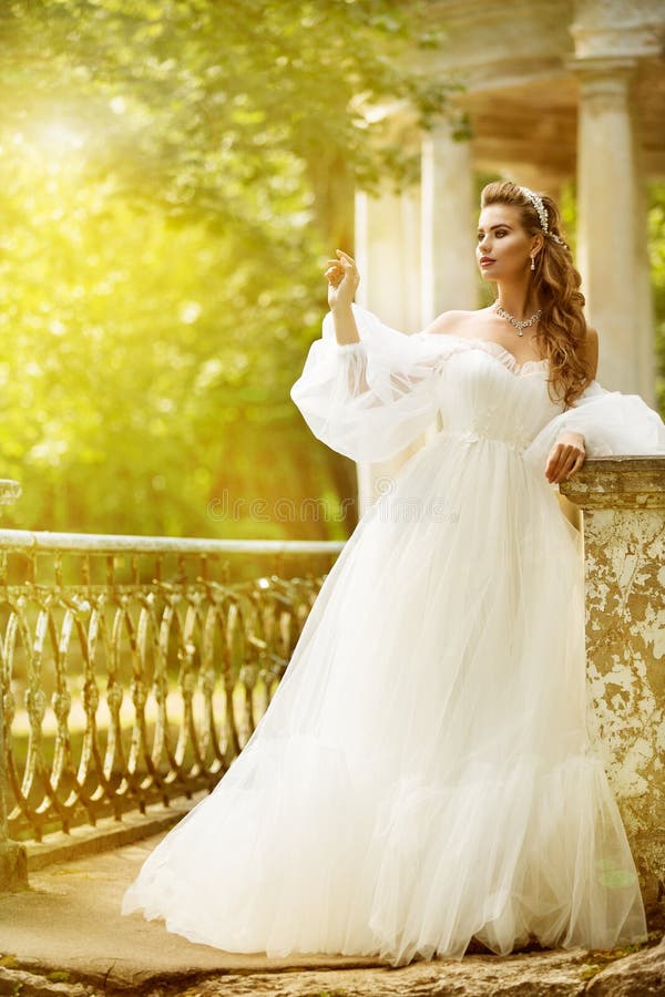 Bride Outdoor Portrait, Beautiful Wedding Fashion Model in Elegant White Dress