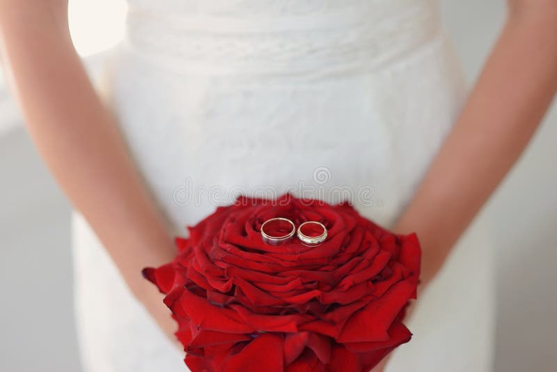 Bride with red rose