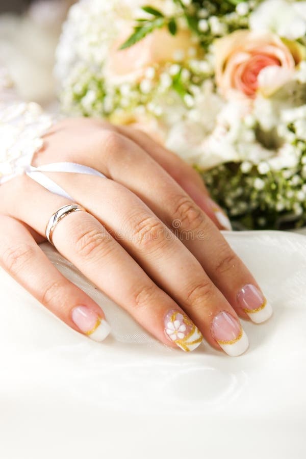 Bride's hand stock images
