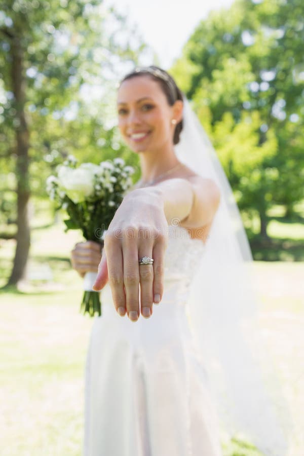 Bride Showing Wedding Ring in Garden Stock Photo Image of adult