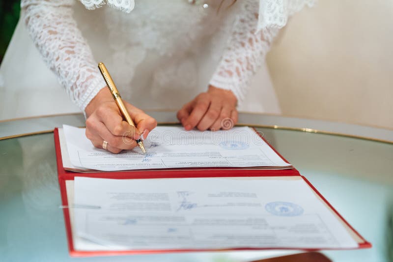 Bride Signing Signature on Wedding Certificate Stock Photo Image of flower, finger 53358020