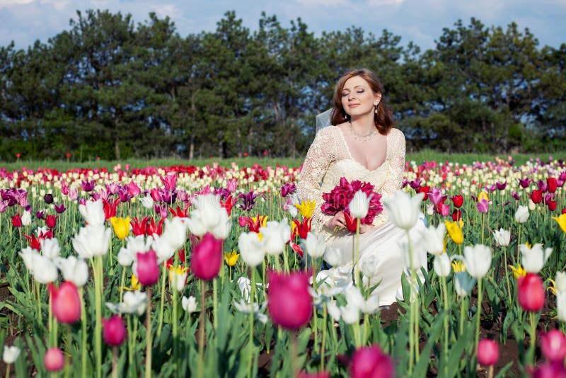 Bride in tulips field