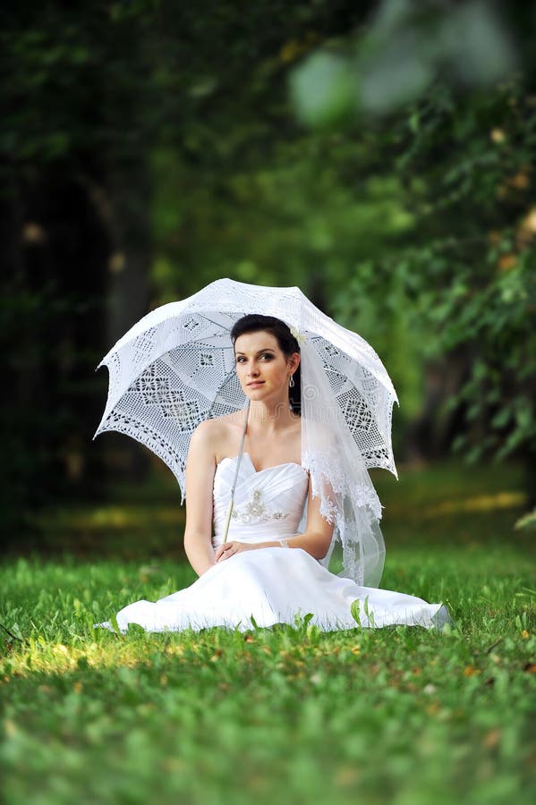 Bride with umbrella