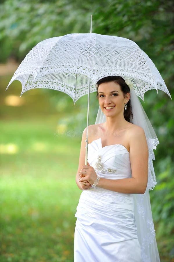 Bride with umbrella