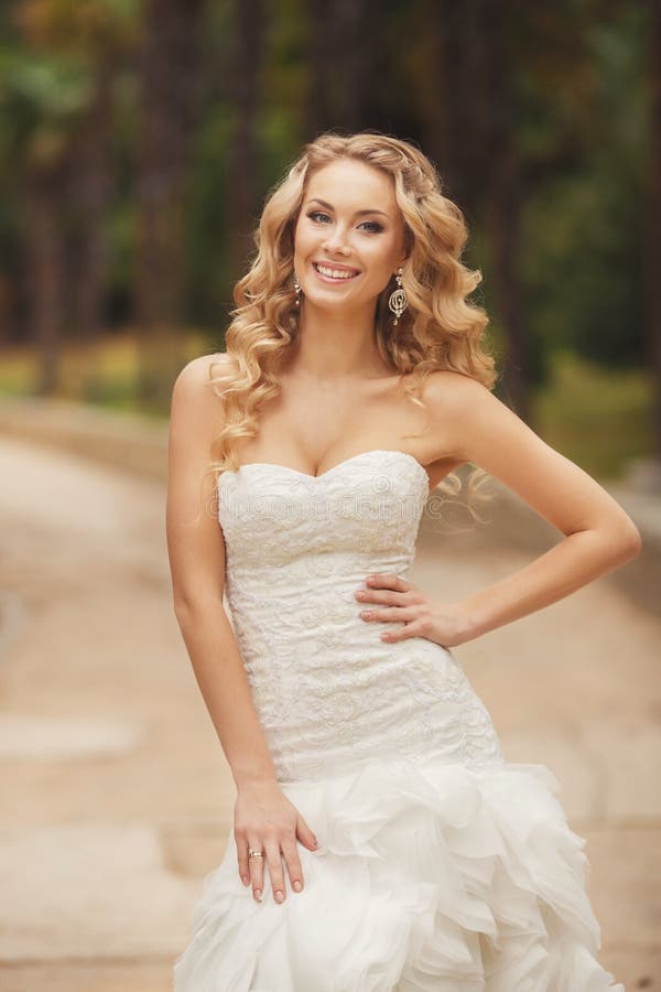 Girl blonde hair blue eyes wedding gown