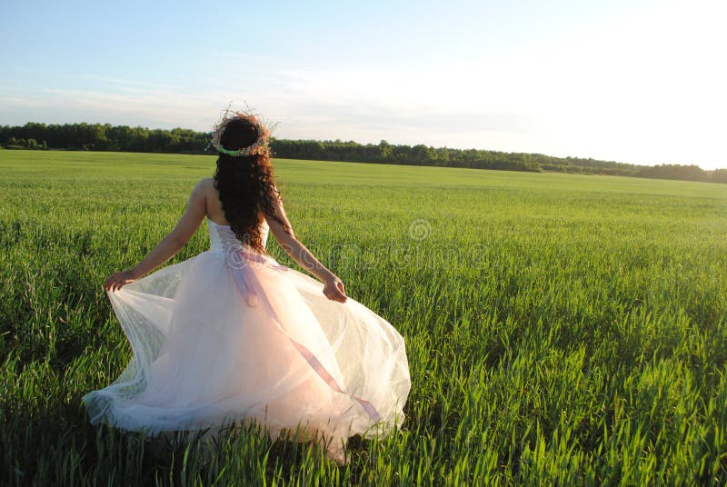 Bride in a wheat field.