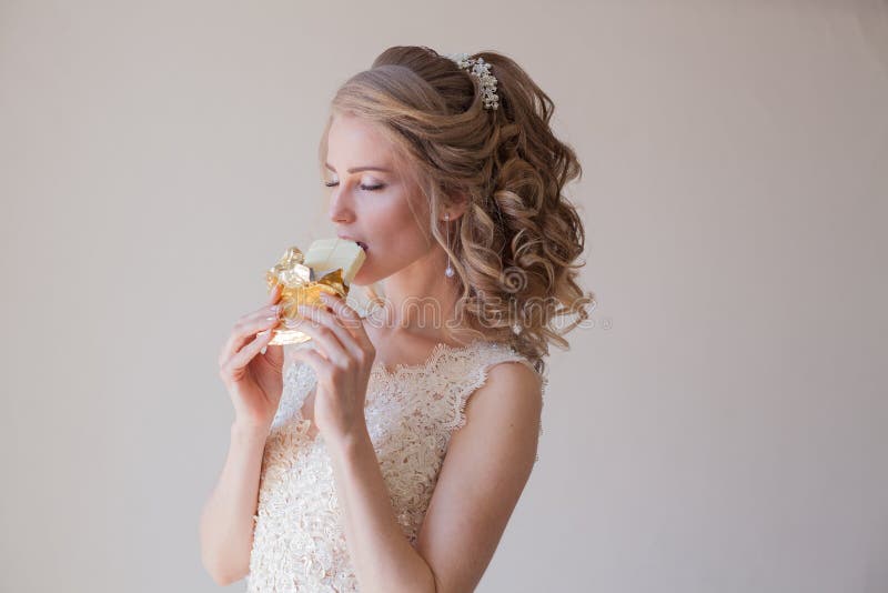The bride is white chocolate candy wedding portrait royalty free stock photography