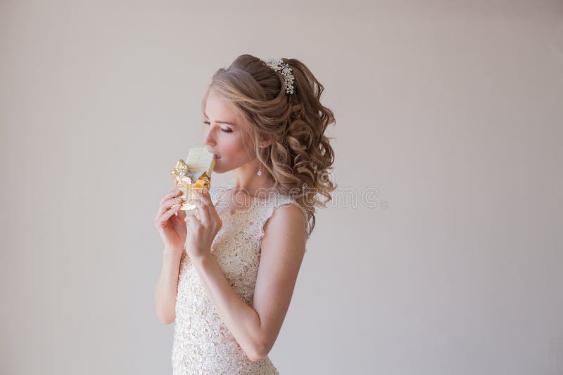The bride is white chocolate candy wedding portrait stock photos