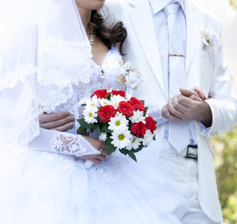 Bridegroom keeping bride hand