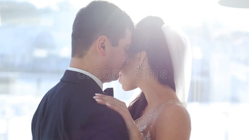 Brides at the window terrace