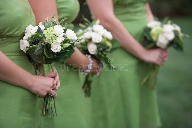 Four Bridesmaids Holding Wedding Bouquets Stock Image - Image of rose ...