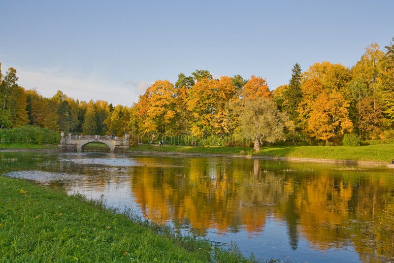 Bridge and autumn landscape