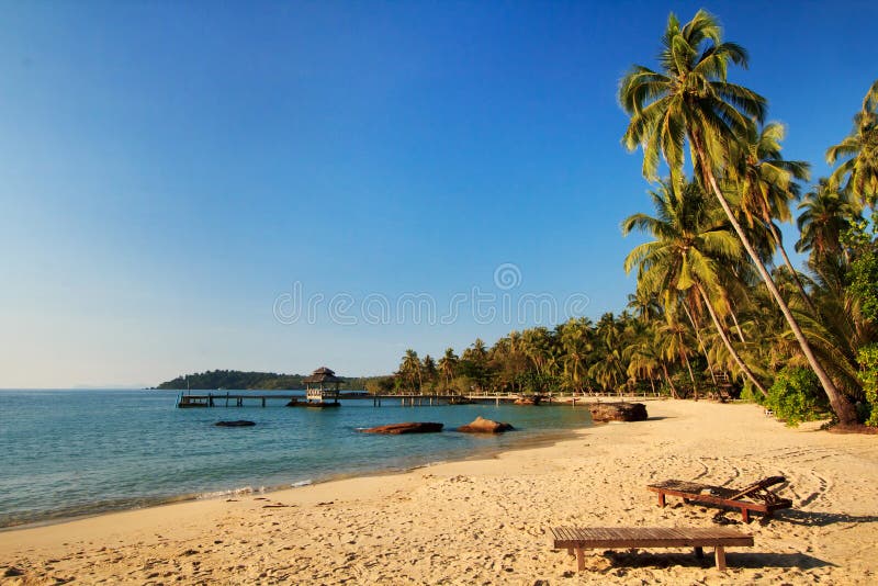 Bridge lead to tropical beach