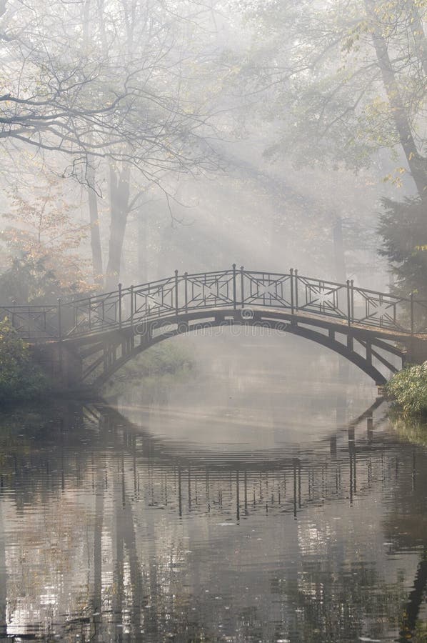 Bridge in misty morning