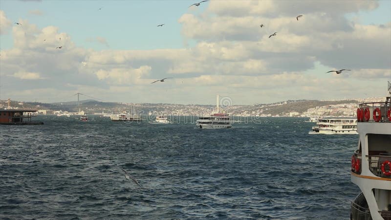 Bridge over the Bosphorus, beautiful clouds and pleasure boats. Bosphorus bridge over the river stock video