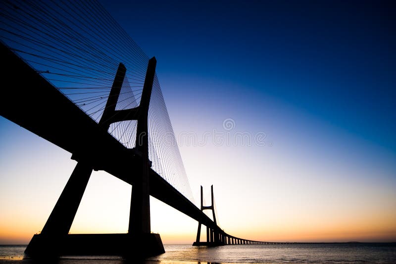 Sunrise at Vasco da Gama bridge Lisbon Portugal. Sunrise at Vasco da Gama bridge Lisbon Portugal