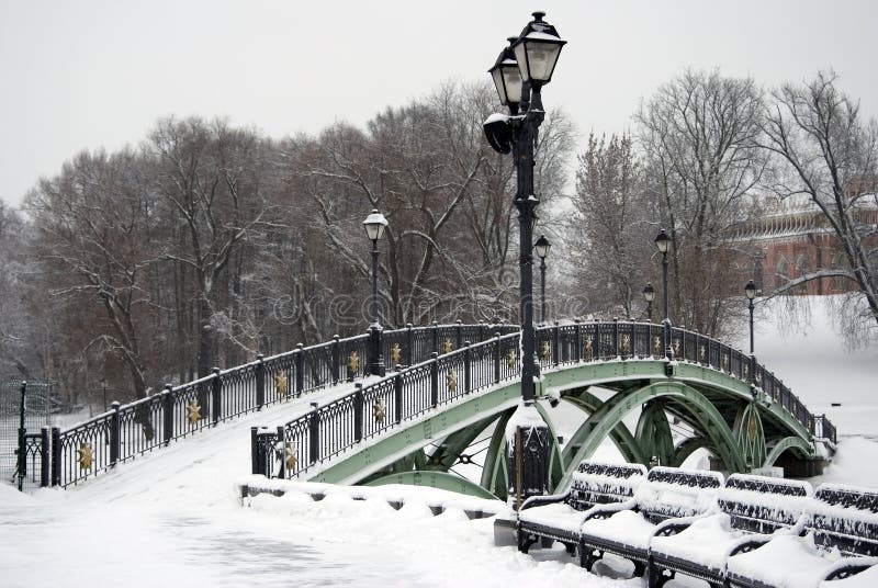 A bridge under the snow. Russian winter. Color photo taken in Moscow city, in Tsaritsyno park. A bridge under the snow. Russian winter. Color photo taken in Moscow city, in Tsaritsyno park.