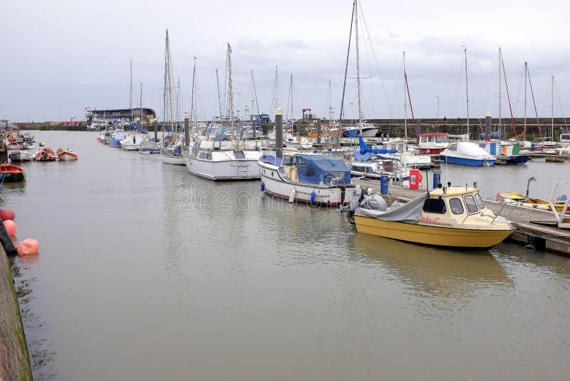 Bridlington, Yorkshire, UK. April 24, 2018. Yachts and boats moored at the Marina in the Harbor on a overcast day in April at Bridlington in North Yorkshire, UK. Bridlington, Yorkshire, UK. April 24, 2018. Yachts and boats moored at the Marina in the Harbor on a overcast day in April at Bridlington in North Yorkshire, UK.