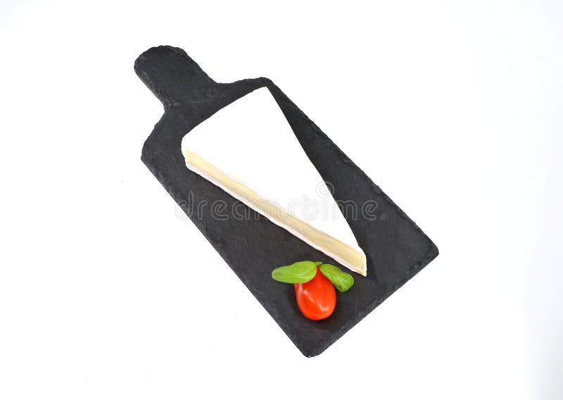 Brie, French Soft Cheese, on a Slate Serving Plate with Cutting Board