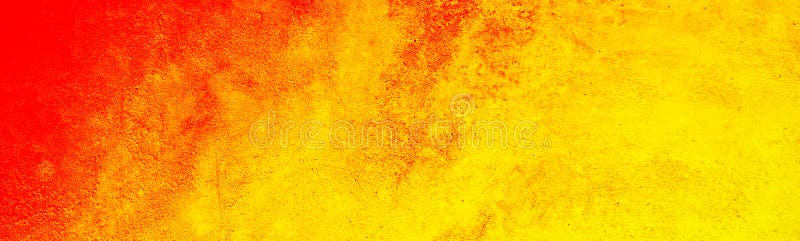 Bright abstract yellow orange red background. Toned rough surface texture. Colorful background with space for design.